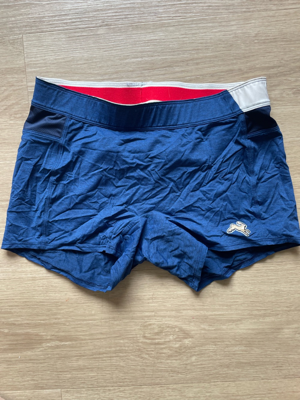 Tracksmith Navy Bell Lap Shorts with Red Waistband Trim